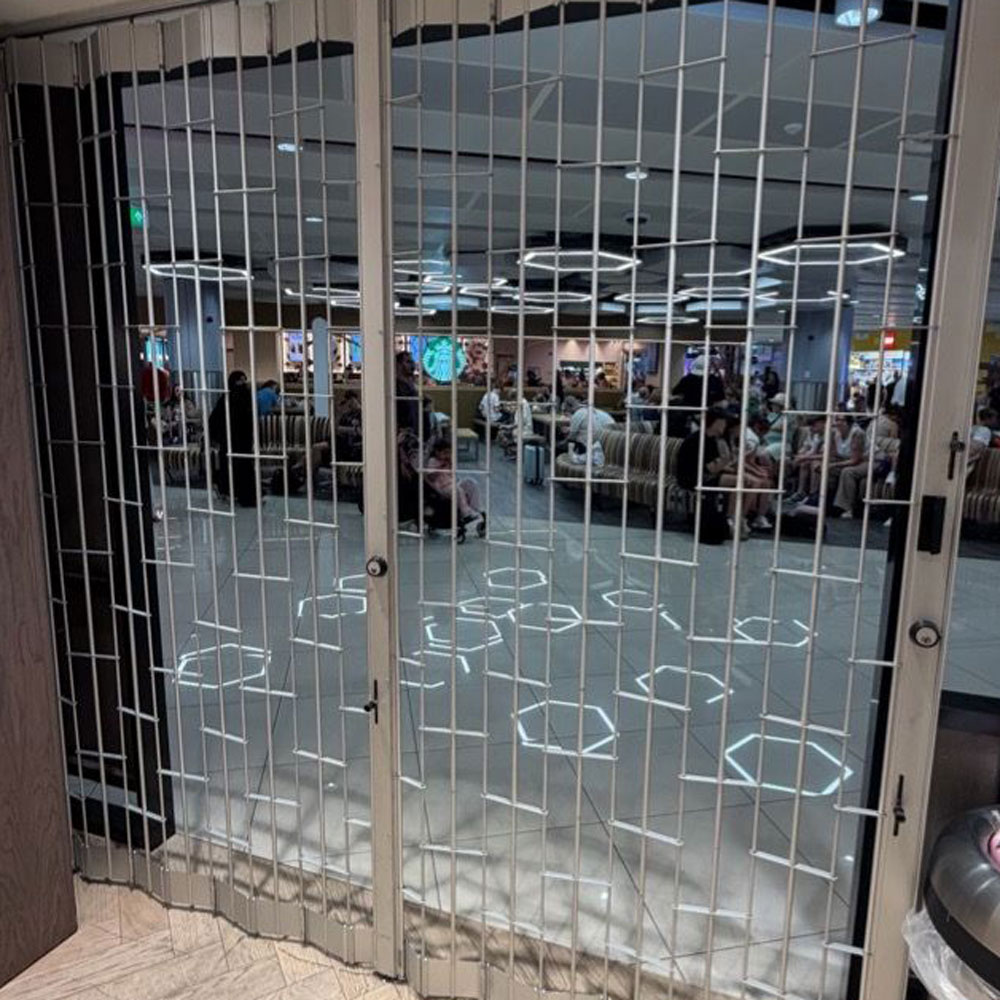 Sliding security grille Manchester Airport Sliding security grille Manchester Airport